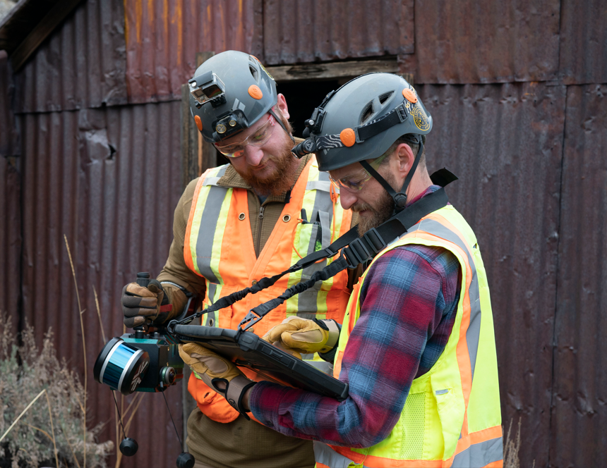 Burgex team collecting and reviewing field data.